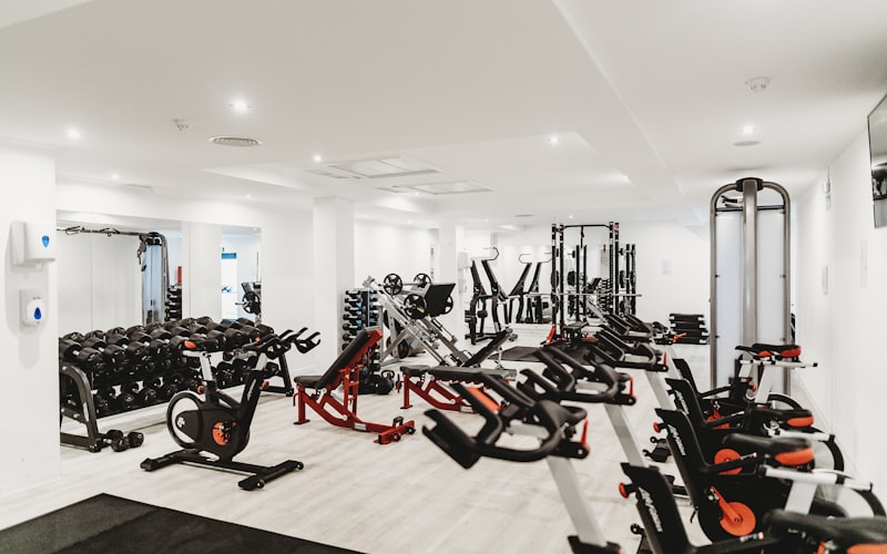 A dynamic magazine style layout showing diverse people working out, representing fitness articles, health tips, and news